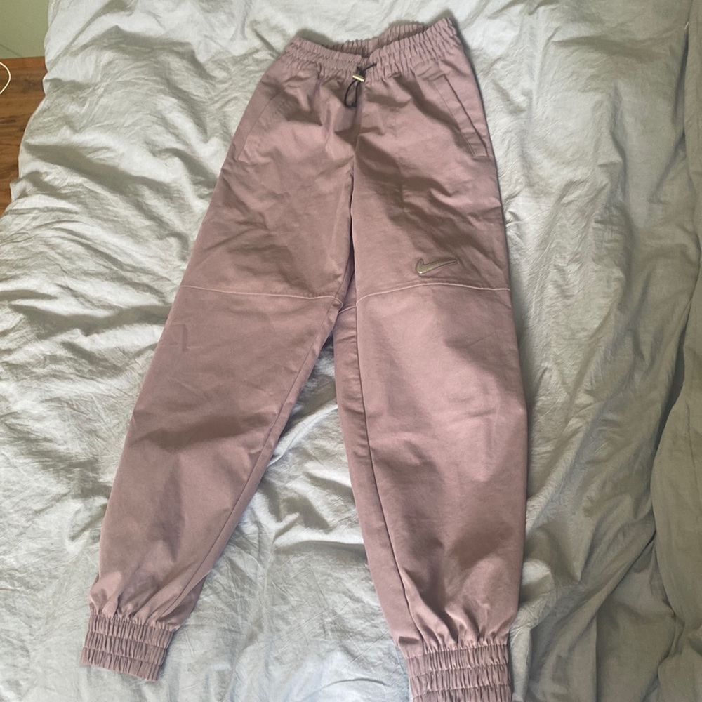 Nike Sportswear Woven Swoosh Pants in Purple